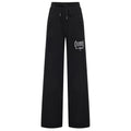 comme des fuckdown - pantaloni felpa stampa e borchie